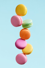 Wall Mural - Macaron Biscuit. Colorful Macaroons Flying