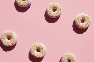 Wall Mural - Donuts On Pink Background