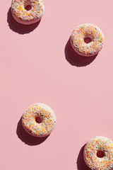 Wall Mural - Donuts On Pink Background