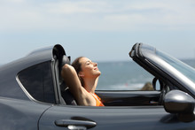 Relaxed Tourist In A Roadster Car On Summer Vacations