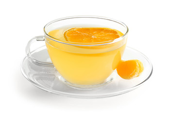 Glass cup of tangerine tea on white background