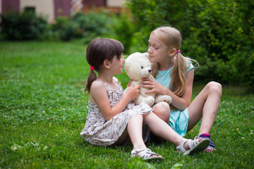 little girl girlfriend on the lawn