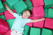 © Africa Studio - Cute boy playing among soft cubes