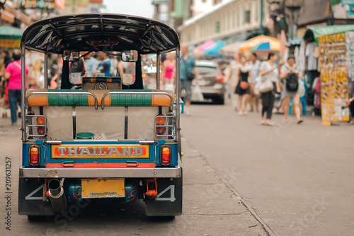 Tuk Tuk (Thai traditional taxi car) parking for wait a tourist passenger at famo Wallpaper Mural