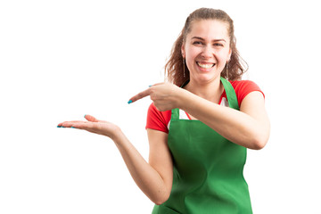 Poster - Female supermarket or retail employee holding invisible object