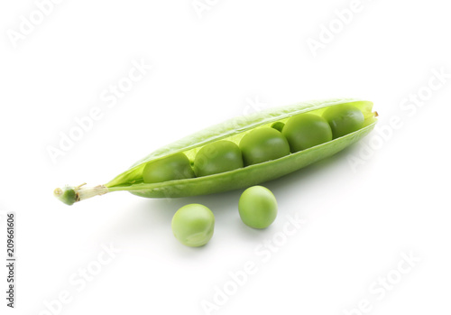 Fotografía Pod with fresh green peas on white background