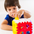 Child psychology, preschooler doing test with didactic cube