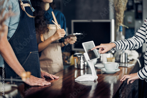Cuadros en Lienzo customer self service order drink menu with tablet screen at cafe counter bar,seller coffee shop accept payment by mobile