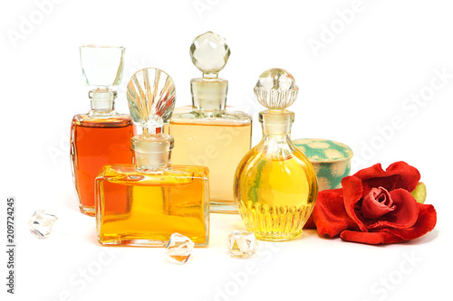 Vintage bottles of perfume with the glass stoppers, old cosmetic face  powder an Wallpaper Mural
