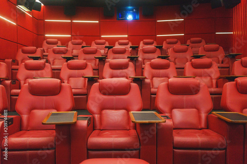 Movie Theater Empty Auditorium With Red Leather Comfortable Chair