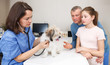 © JackF - Female veterinarian examining puppy in clinic