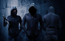 Gang Of Robbers Or Burglars Dressed In Black