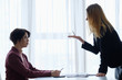boss reproaching her employee. business woman getting a reprimand or reproof chief manager. superior and subordinate professional relationship.
