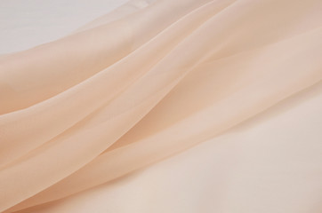 silk fabric, organza is light beige.