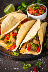 Wall Mural - Mexican pork tacos with vegetables and salsa.