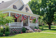 Charming Home Decorated With American Flags For The Fourth Of July