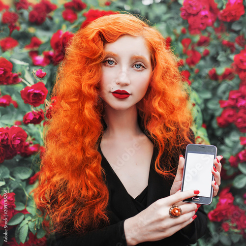 Young Beautiful Unusual Redhead Girl With Very Long Curly Hair On