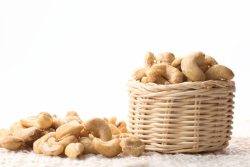 Wall Mural - Cashew nuts on the basket.