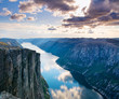 Majestic view of the Lysefjorden, with mountains on the sunset. The mountain Kjerag in Forsand municipality in Rogaland county, Norway.