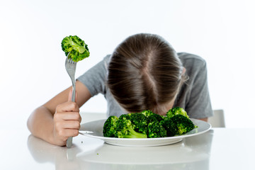 Children do not like to eat vegetables in healthy eating concept