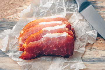 Close-up of sliced pieces of dried pork, meat cut for cold appetizers