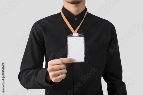 employee hand showing blank id card badge holder for mockup template logo branding background Poster Mural XXL