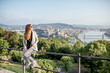 © rh2010 - Young woman enjoying beautiful aerial cityscape view on Budapest during the morning light, Hungary