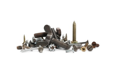 Pile of old rusty screw heads, bolts, metal nuts, isolated on white background