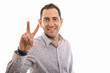 © Catalin Pop - Portrait of business man showing peace or victory gesture