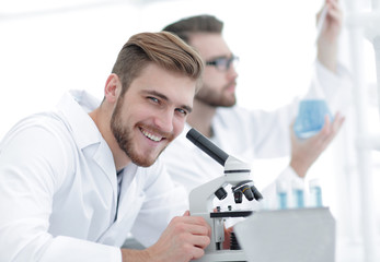 Wall Mural - male researcher carrying out scientific research in a lab