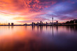 Sun rising over Auckland city, city scape, silhouette, New Zealand