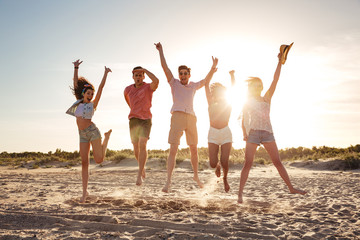 Canvas Print - Group of excited young friends