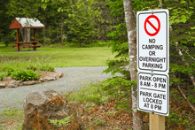 No Camping Or Overnight Parking Sign In Rural Park.
