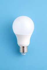 Light bulb on blue