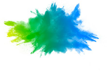 Yellow Green Powder Explosion On White Background. Green Color Dust Splash.