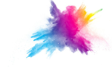 Wall Mural - Explosion of rainbow color powder on white background.