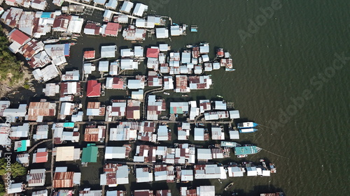 Coastal Asian fishing town. Poor slum town at risk from climate change and rising sea levels.