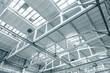 ceiling of industrial building inside bottom view. roof with top lighting