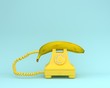 © Small Smiles_dimple - Creative idea layout fresh banana with yellow retro telephone on bluish background.  Fruit minimal concept.