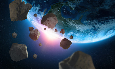 Wall Mural - Asteroids near the planet Earth. A view of the globe from space. Elements of this image are furnished by NASA