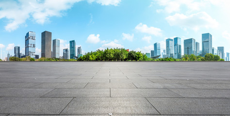 Empty square floor and modern city commercial architecture panorama in shenzhen,China