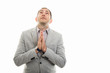 © Catalin Pop - Portrait of business man showing praying gesture