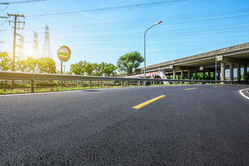 Empty asphalt highway and bridge building