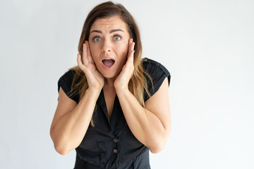 Poster - Portrait of shocked, scared, frightened Caucasian lady. Young woman getting shocking news and extremely surprised. Bad news and surprise concept