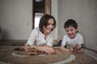 © natalialeb - Little boy having fun with  mother at home