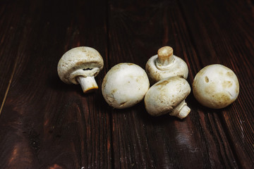 champignons on a wooden background