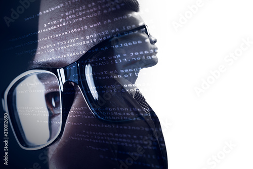 Photographie The double exposure image of the businessman standing overlay with source code and programmer image and copy space