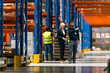© Stock Rocket - Managers walking through the warehouse