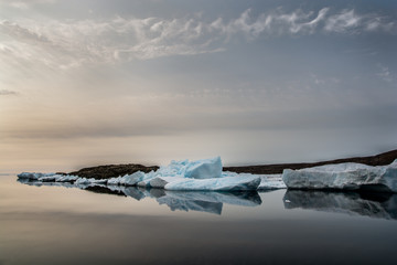 Wall Mural - north shore in canada. ice and mirror sea.