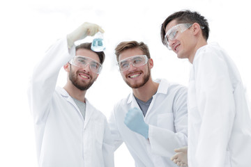 Wall Mural - happy scientists look at the result of their work